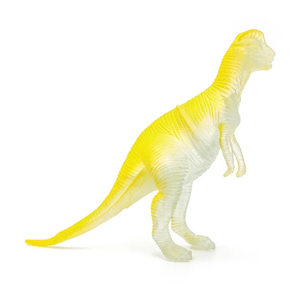 Vue de côté jouet de dinosaure en plastique jaune sur fond blanc — Photo