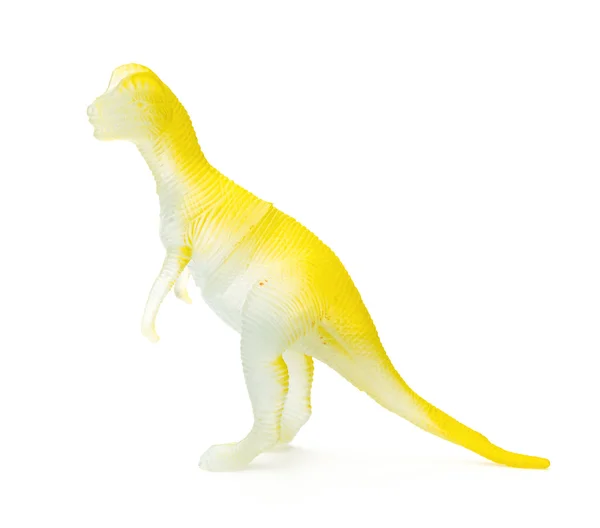 Sidan Visa gul plast dinosaurie leksak på en vit bakgrund — Stockfoto