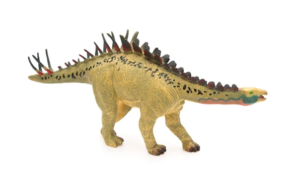 Vue de côté jouet huayangosaurus jaune sur fond blanc — Photo