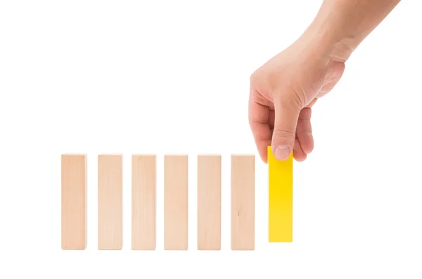 Making up a line of wooden toy blocks on white background with clipping path — Stock Photo, Image
