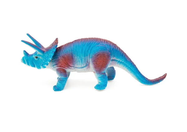 Vista lateral azul triceratops juguete sobre un fondo blanco — Foto de Stock