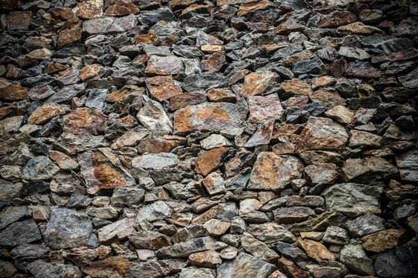 Fundo e textura da parede feita por rochas — Fotografia de Stock