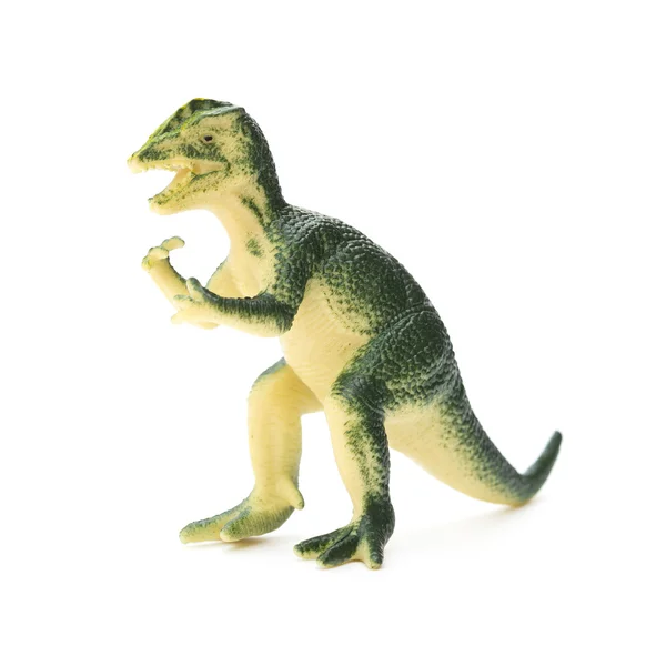 Juguete Dilophosaurus verde sobre un fondo blanco — Foto de Stock
