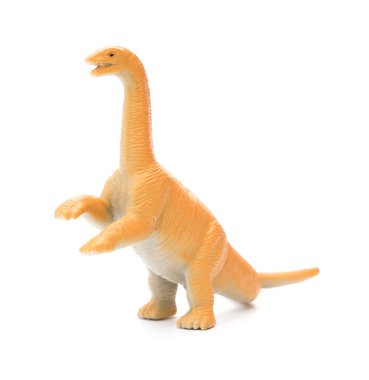 Beyaz bir arka planda turuncu diplodocus oyuncak