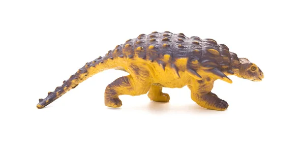 Vue latérale jouet de dinosaure en plastique sur fond blanc — Photo