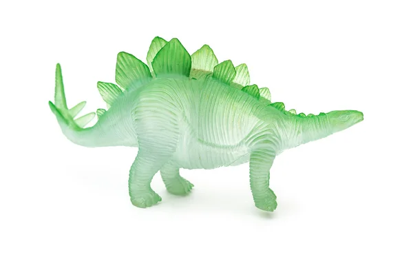 Juguete estegosaurio verde vista lateral sobre un fondo blanco — Foto de Stock