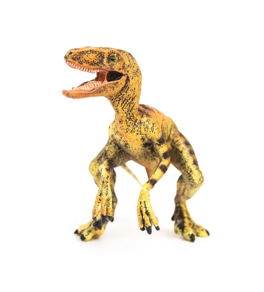 Widok z przodu żółty velociraptor zabawka na białym tle — Zdjęcie stockowe