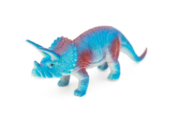 Juguete triceratops azul sobre un fondo blanco — Foto de Stock