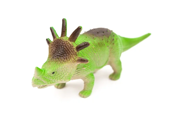 Groene styracosaurus speelgoed op een witte achtergrond — Stockfoto