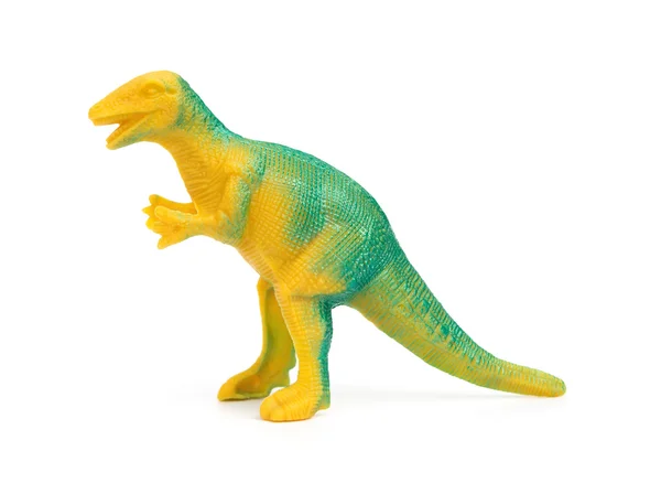 Sidan Visa grön dinosaurie leksak på en vit bakgrund — Stockfoto