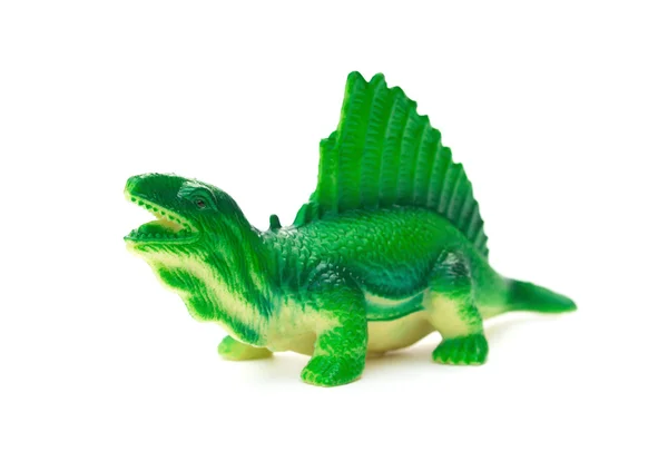 Gröna dimetrodon leksak på en vit bakgrund — Stockfoto