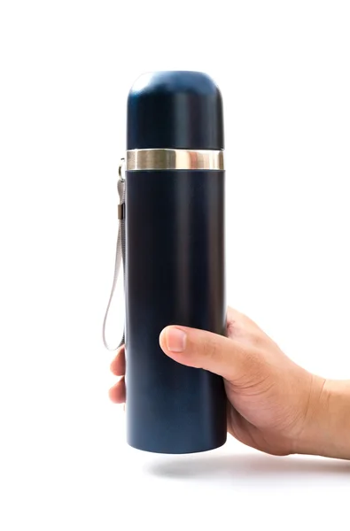 Hand holding a blue vacuum tumbler on a white background — Stock Photo, Image