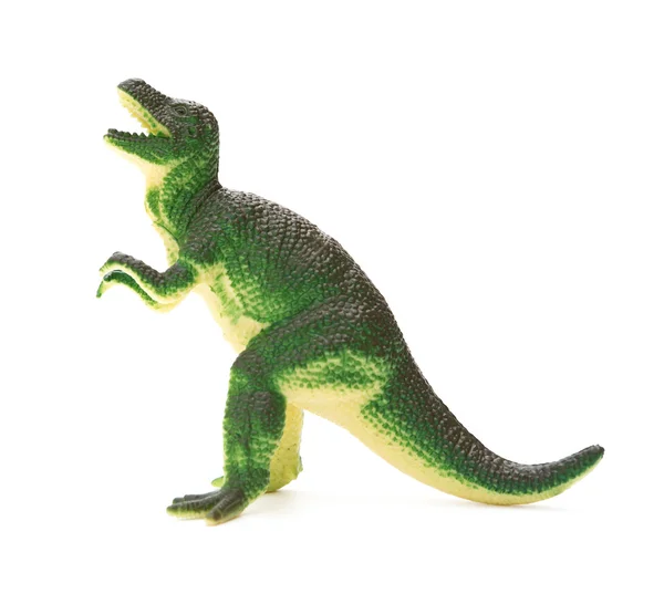 Juguete dinosaurio plástico verde vista lateral sobre un fondo blanco — Foto de Stock