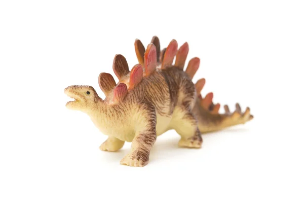 Jouet stegosaurus brun sur fond blanc — Photo