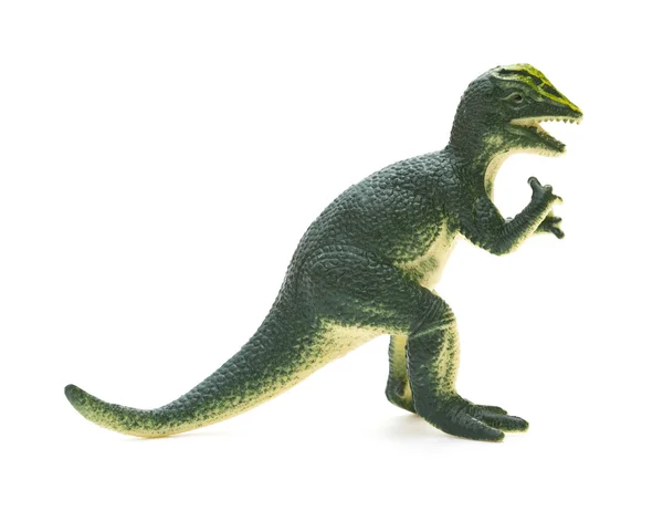 Vue latérale jouet Dilophosaurus vert sur fond blanc — Photo
