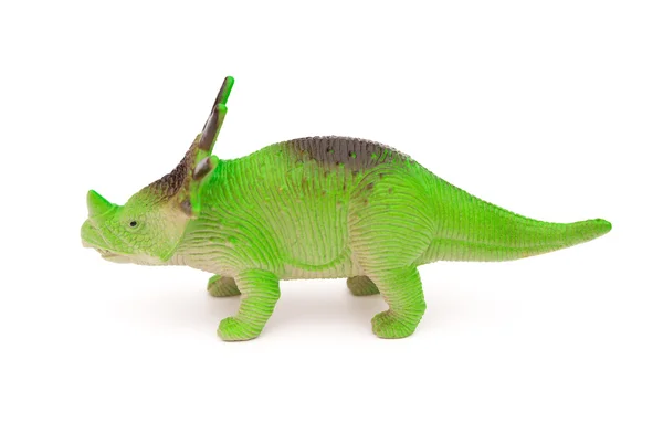 Vue latérale jouet styracosaurus vert sur fond blanc — Photo