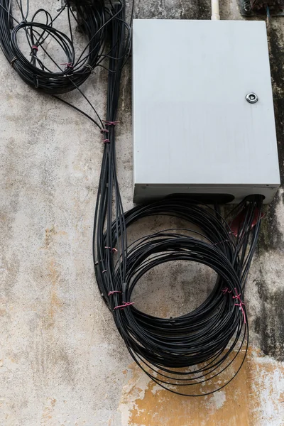 Distribution box of fiber cables on wall — Stock Photo, Image