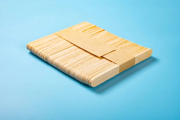 Bunch Popsicle Sticks Blue Backgrond — Stock Photo, Image