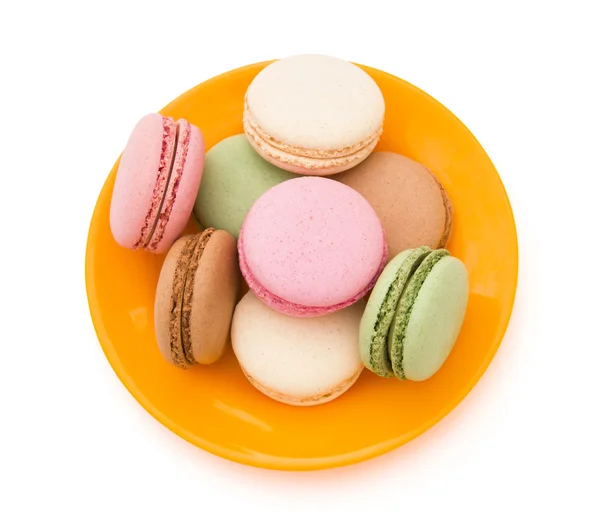 Colorful macaroons on plate with clipping path — Stock Photo, Image