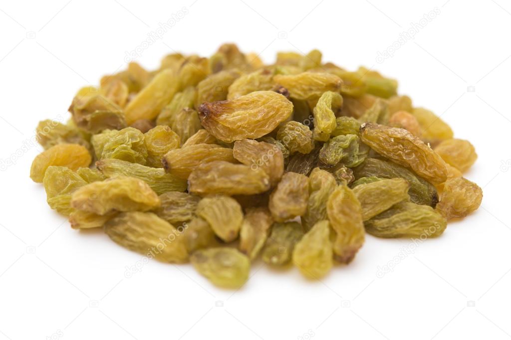 Yellow raisins on a white background