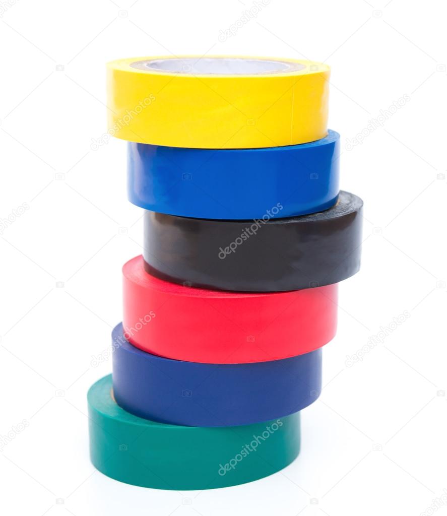 Stack of different color electrical tapes on white background