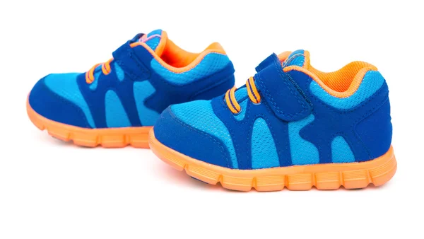 Pair of blue sporty shoes for kid on white — Stock Photo, Image