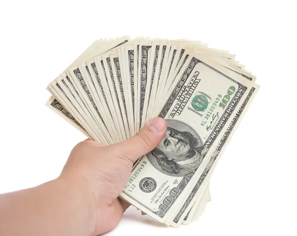 Hand holding stacks of 100 USD paper currency on white with clipping path — Stock Photo, Image