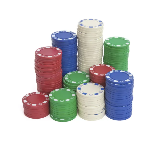 Lots of casino chips on white with clipping path — Stock Photo, Image