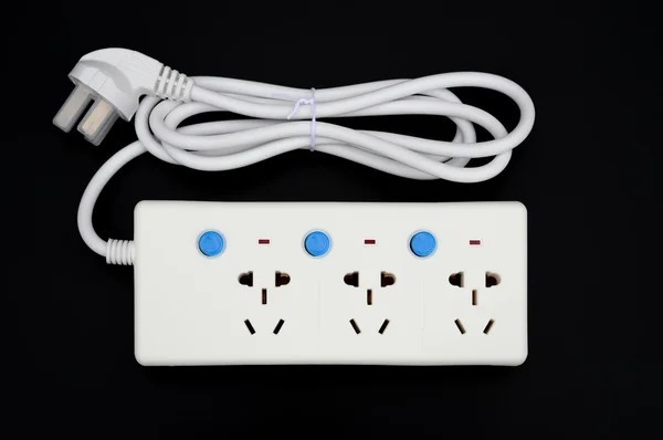 Multi sockets power extension with individual switiches on black — Stock Photo, Image