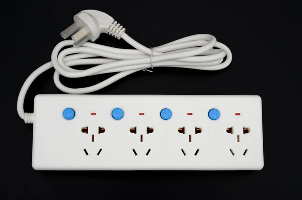 Multi sockets power extension with individual switiches on black — Stock Photo, Image