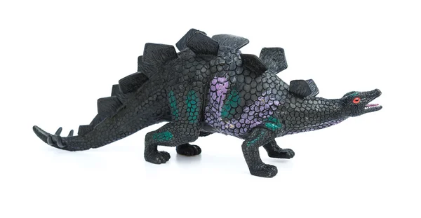 Stegosaurus leksak på en vit bakgrund — Stockfoto