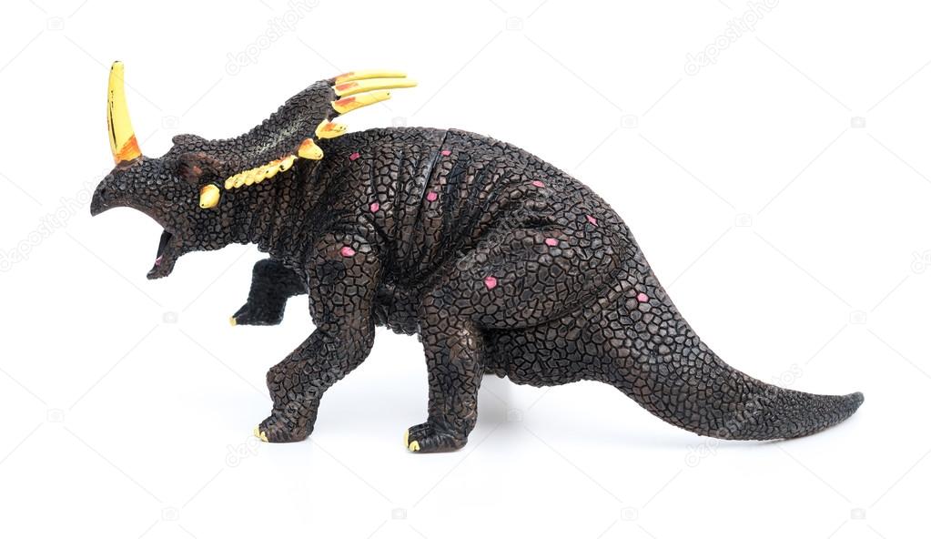 triceratops toy on a white background