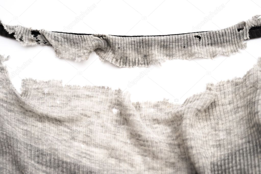 mans shirt worn out badly on white background