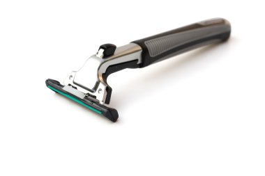 Beyaz bir arka plan üzerinde tıraş makinesi