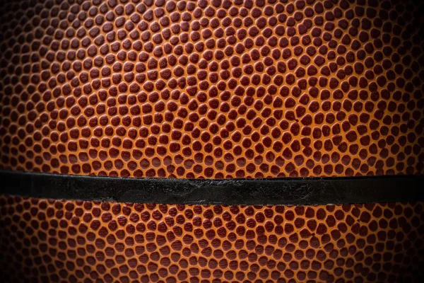 Perto de uma bola de basquete — Fotografia de Stock