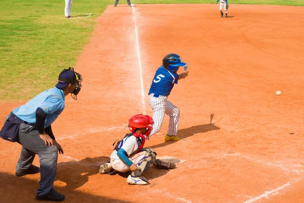 Unknown batter hitting the ball — Stock Photo, Image