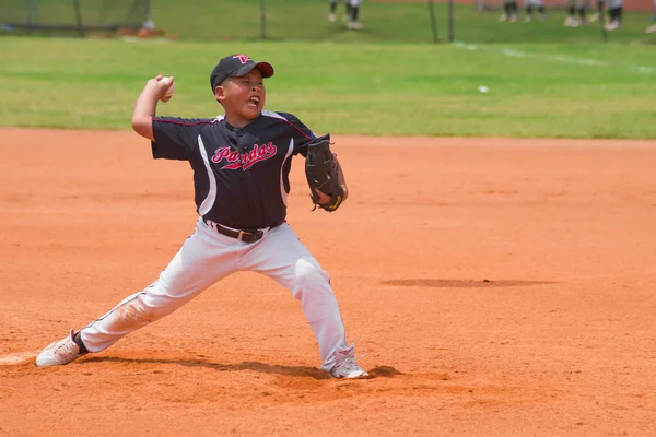 Unknown pitcher throwing the ball — Stock Photo, Image