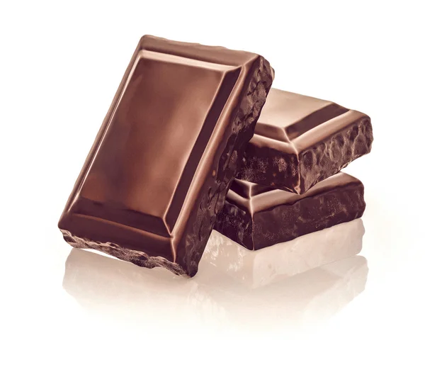 Chocolate blocks stack on white background — Stock Photo, Image