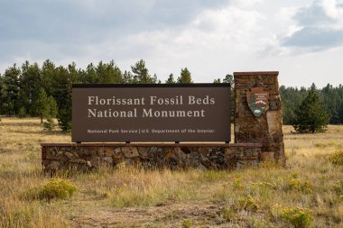 Florissant, Colorado - September 16, 2020: Sign for the Florissant Fossil Beds National Monument clipart