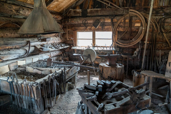 South Park, Colorado - September 16, 2020: Inside of an old abandoned blacksmith shop, in the ghost town near Fairplay, CO USA