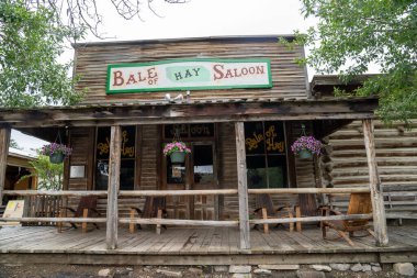 Virginia City, Montana - June 29, 2020: Old historical Bale of Hay Saloon, in the ghost town clipart