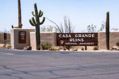 Coolidge, Arizona - May 9, 2021: Sign for Casa Grande Ruins National Monument on a sunny day clipart