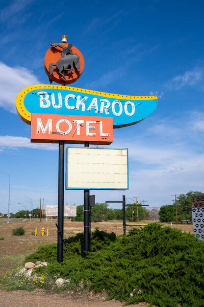 Tucamcari, New Mexico - May 7, 2021: The neon sign for the classic Buckaroo Motel along Route 66
