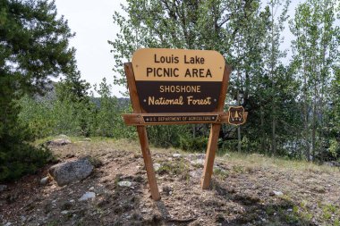 Wyoming, USA - August 6, 2021: Sign for the Louis Lake Picnic Area, part of the Shoshone National Forest clipart
