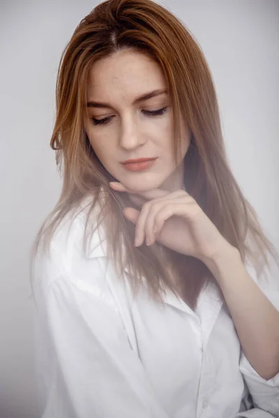 Young woman looking at the camera model isolated background. Beautiful elegant woman. Jewellery advertising concept. Close up portrait. Businesswoman confident portrait. Stock Image