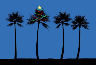 Tropikal iklimde bir plajda bir palmiye ağacı Noel için süslenir. Işıklar gecenin karanlığında parlıyor..