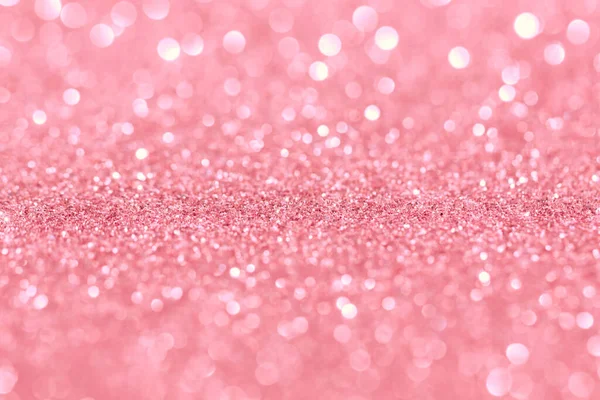 Blurred glitter background rose gold color.