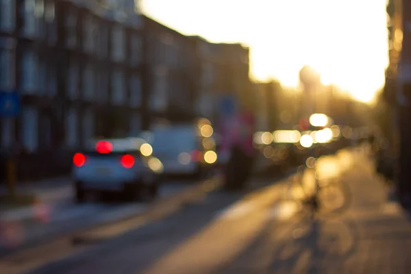 Blurred street view in sunset light.