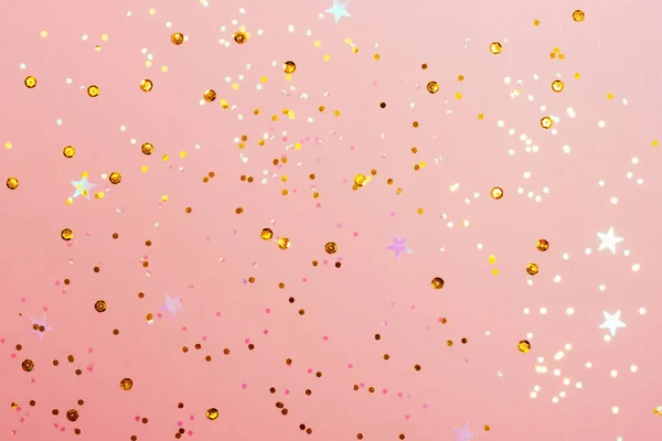 Festive pastel pink background with confetti. — Stock Photo, Image