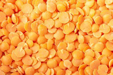 Kırmızı mercimek arka planı. Soyut gıda dokusu.